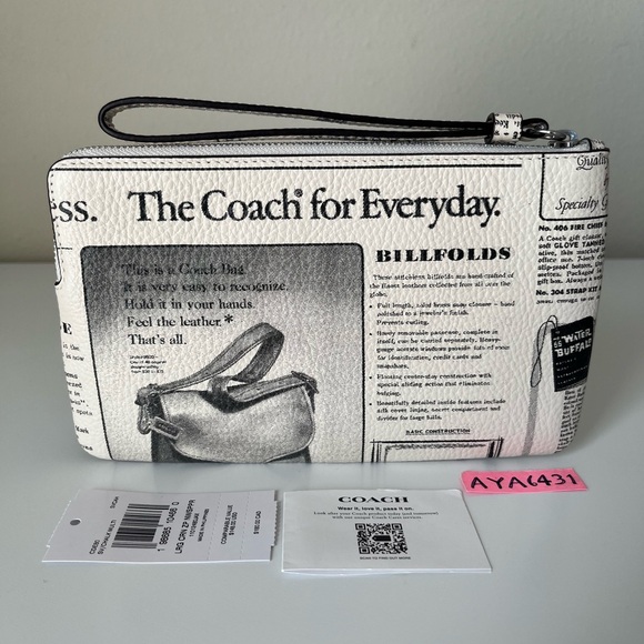 Coach Large Corner Zip Wristlet With Newspaper Print🎈🎈